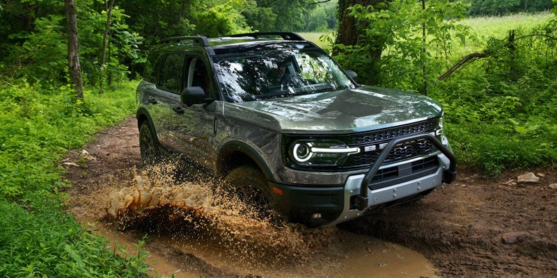 2026 Ford Bronco Sport driving through mud